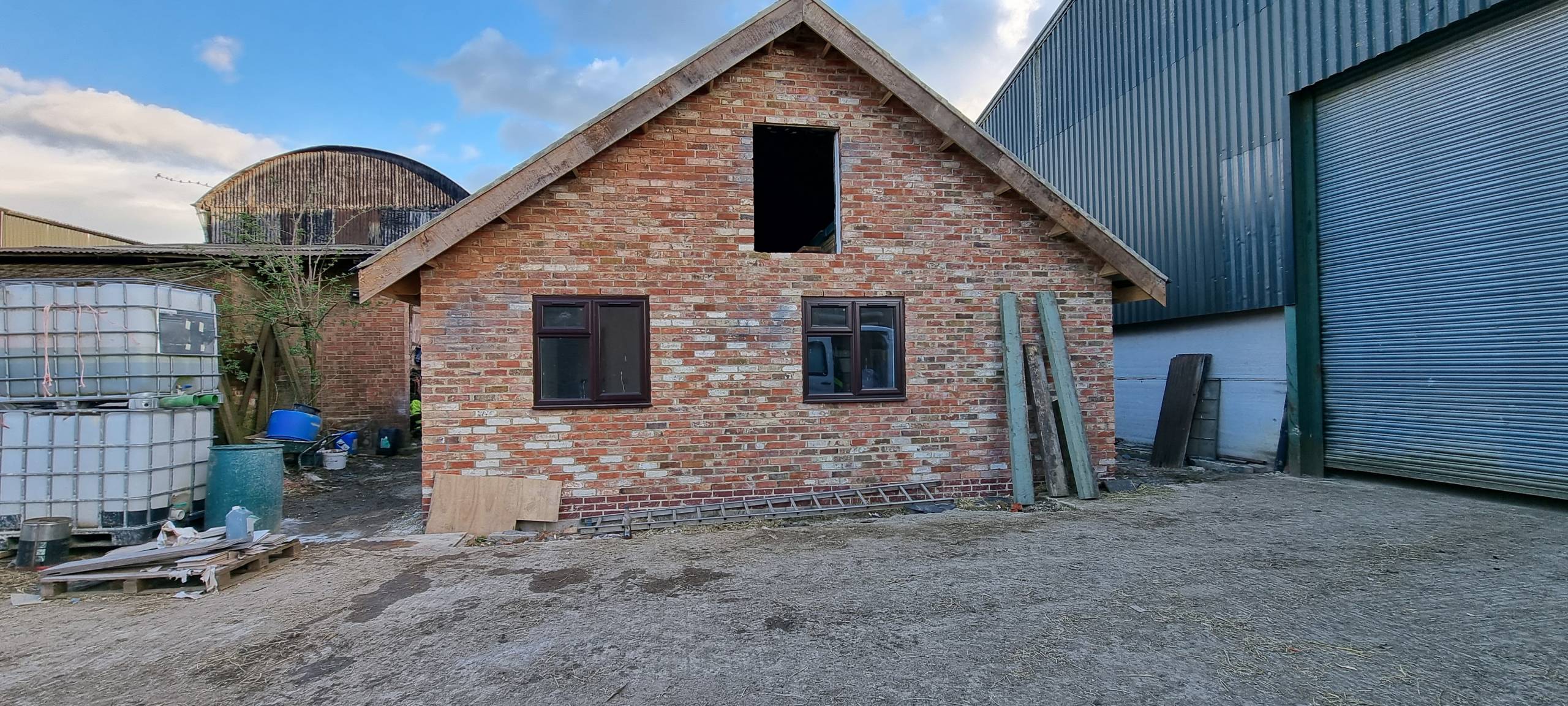 Traditional barn rebuild using reclaimed materials